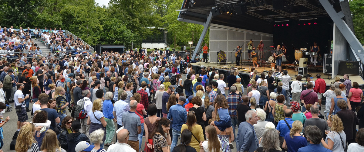 Concert in the Open Air Theatre Amsterdam, Netherlands - August 6, 2016: The Tentempies band in the Open Air Theater (Openluchttheater) in the Vondelpark with spectators in the foreground